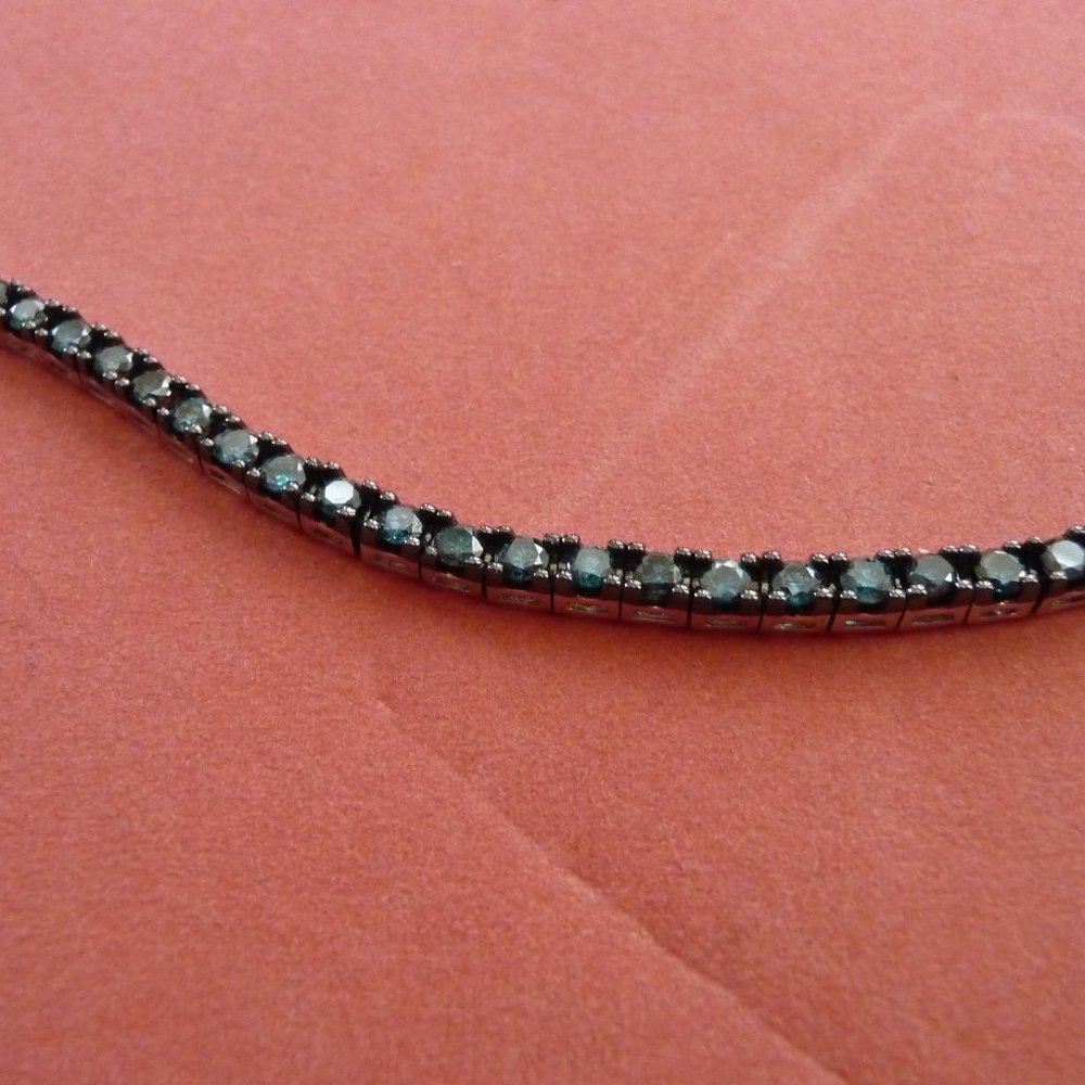 4.5cts Blue (irradiated) diamond bracelet (7 ins)